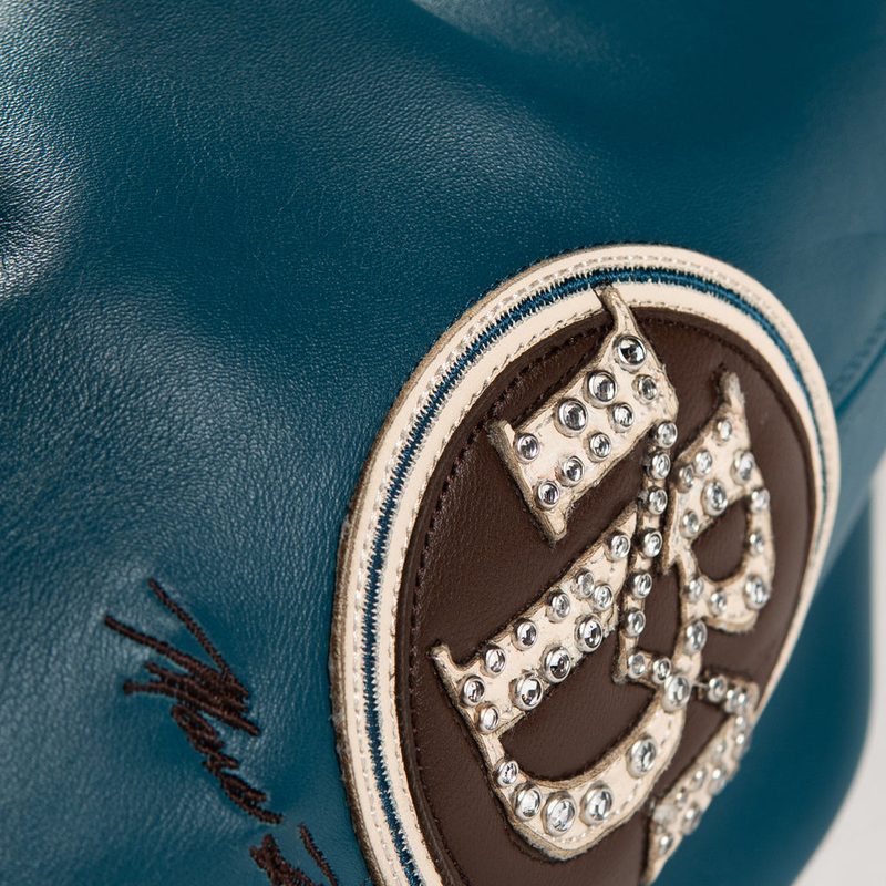 100% Genuine leather - Contrast color saddle seam leather sleeves  - Self leather with direct embroidered wearers left chest artwork  - Marc Buchanan "MB" leather applique branding with rhinestone branding on the wearers left sleeve  - Oversized 2 ply "Pelle Pelle" leather applique artwork with multiple rhinestone placements  - Satin lining with outlined direct embroidered "Pelle Pelle"  - Interior pockets at the inside lining  - Leather collar - Heavy 2x2 rib cuff and hem  - Pelle Pelle custom branded front zipper pull  (3)